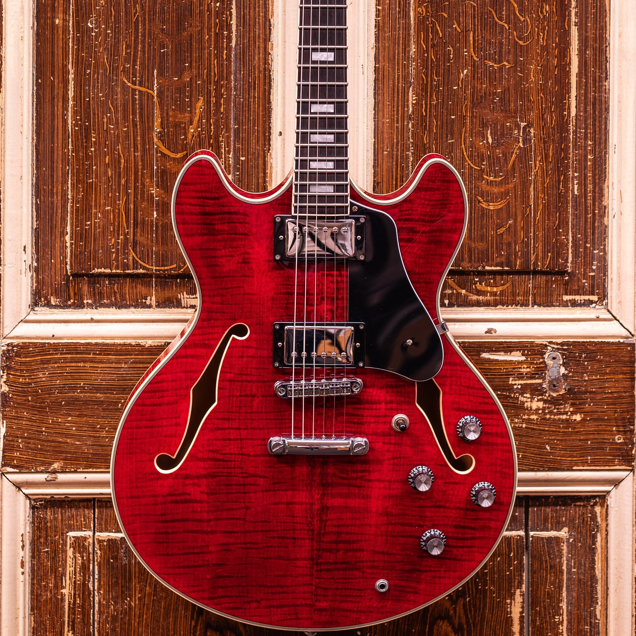 Sire Larry Carlton H7 See Through Red semi-hollowbody gitaar