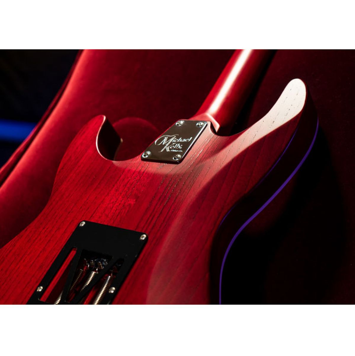 Michael Kelly 63OP Trans Red